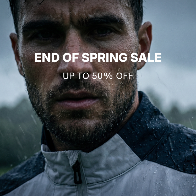 Man wearing a waterproof golf jacket in the rain during Sunice End of Spring Sale, up to 50% off