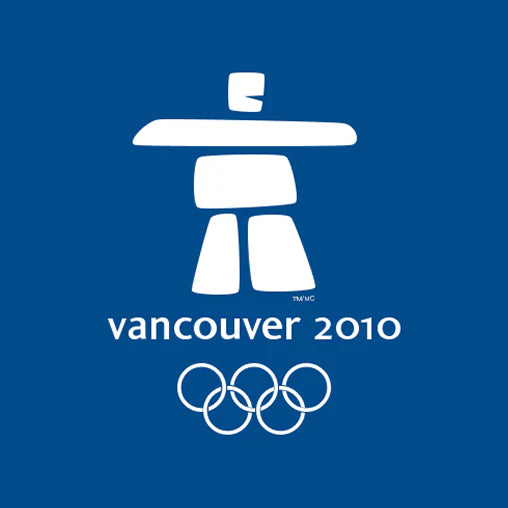 White Inukshuk sculpture logo with 'Vancouver 2010' text and Olympic rings on a blue background